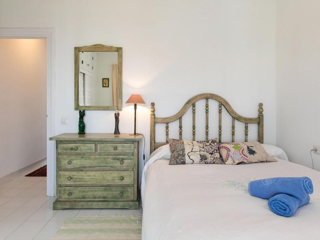 A bed or beds in a room at Holiday Home Jardines de Nerja by Interhome