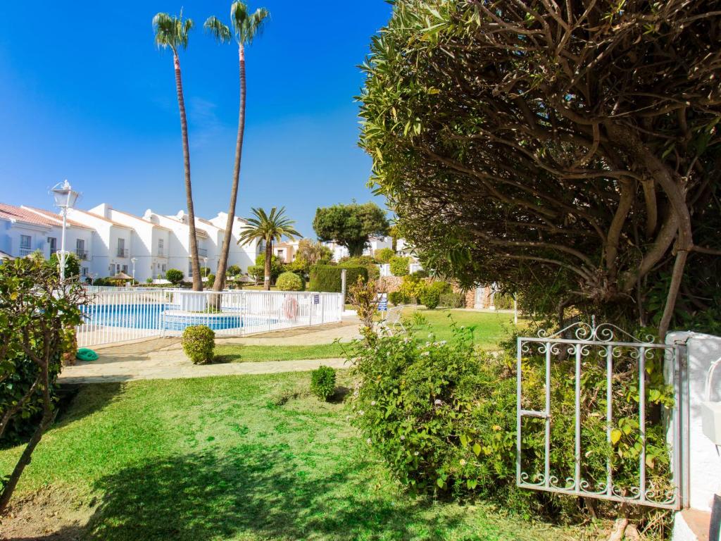 The swimming pool at or close to Holiday Home Jardines de Nerja by Interhome