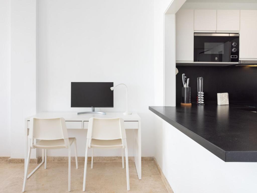 A kitchen or kitchenette at Apartment Playa Negra II by Interhome