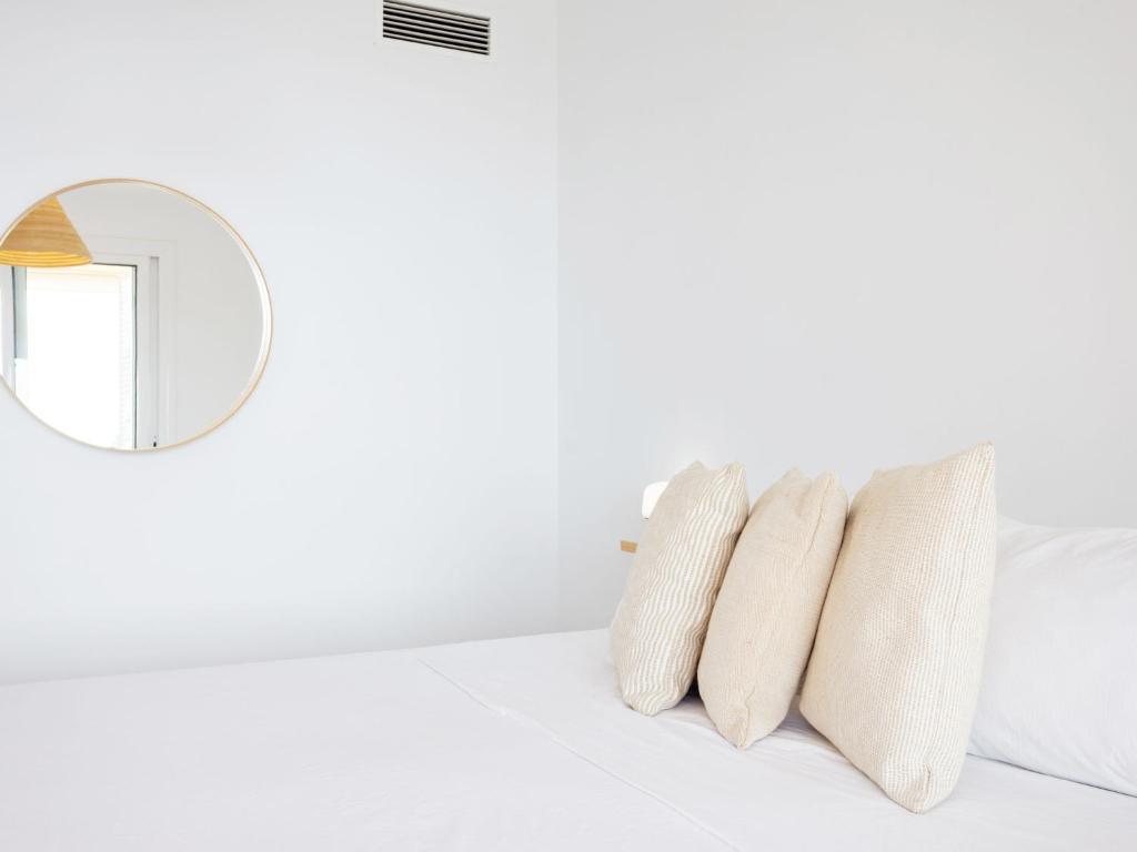 A bed or beds in a room at Apartment Playa Negra II by Interhome