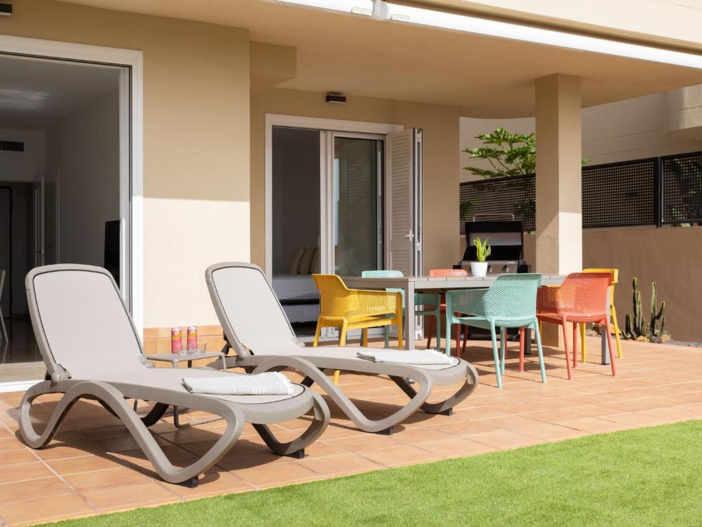 A seating area at Apartment Playa Negra II by Interhome