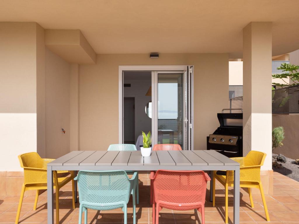 A seating area at Apartment Playa Negra II by Interhome