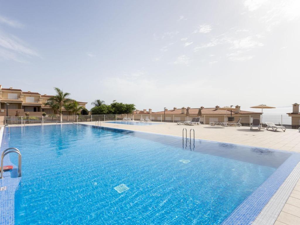 The swimming pool at or close to Apartment Playa Negra II by Interhome