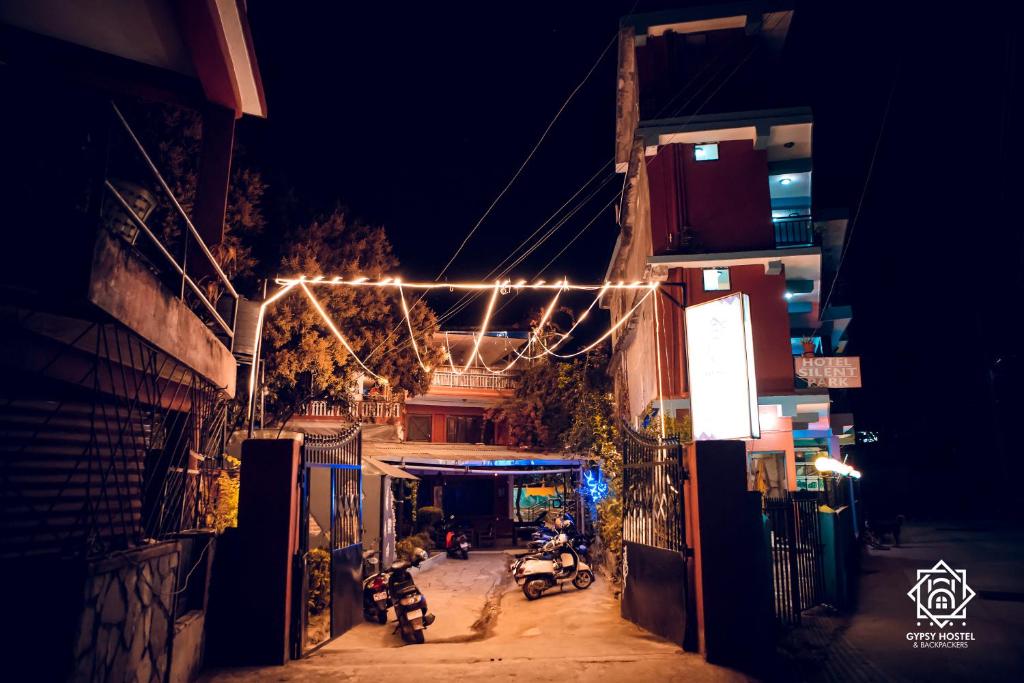 a city street at night with a bunch of lights at Gypsy Hostel & Backpackers in Pokhara