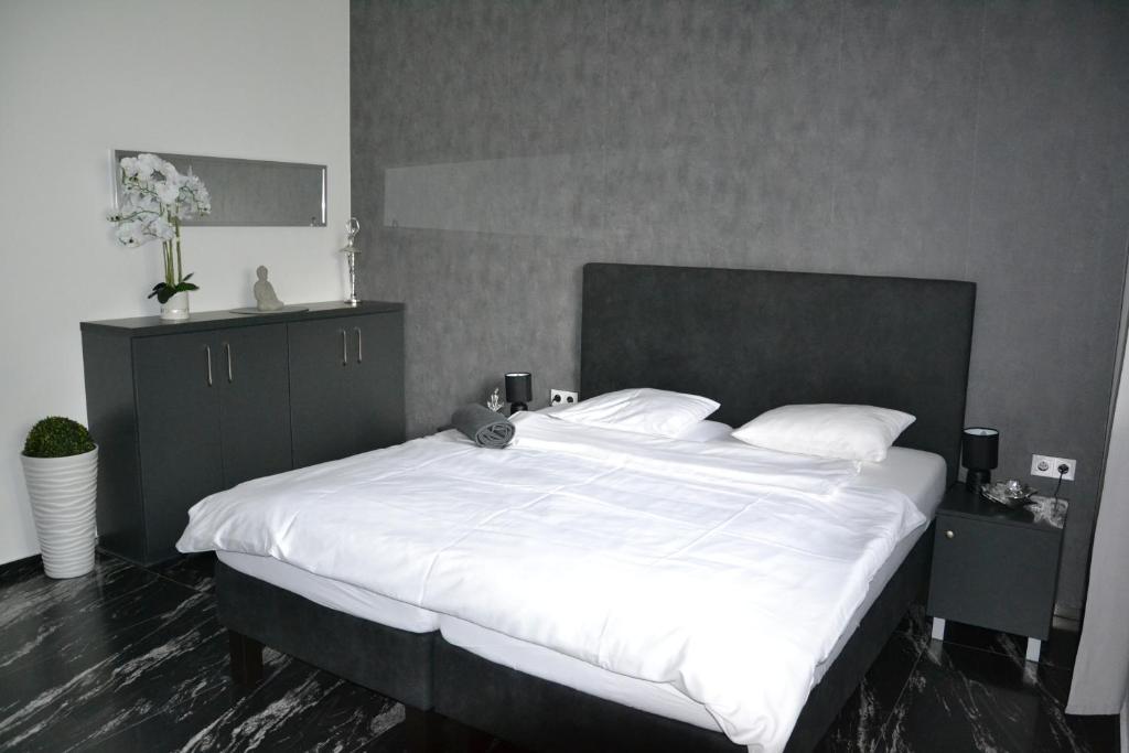 Postel nebo postele na pokoji v ubytování Apartmany u Polanských