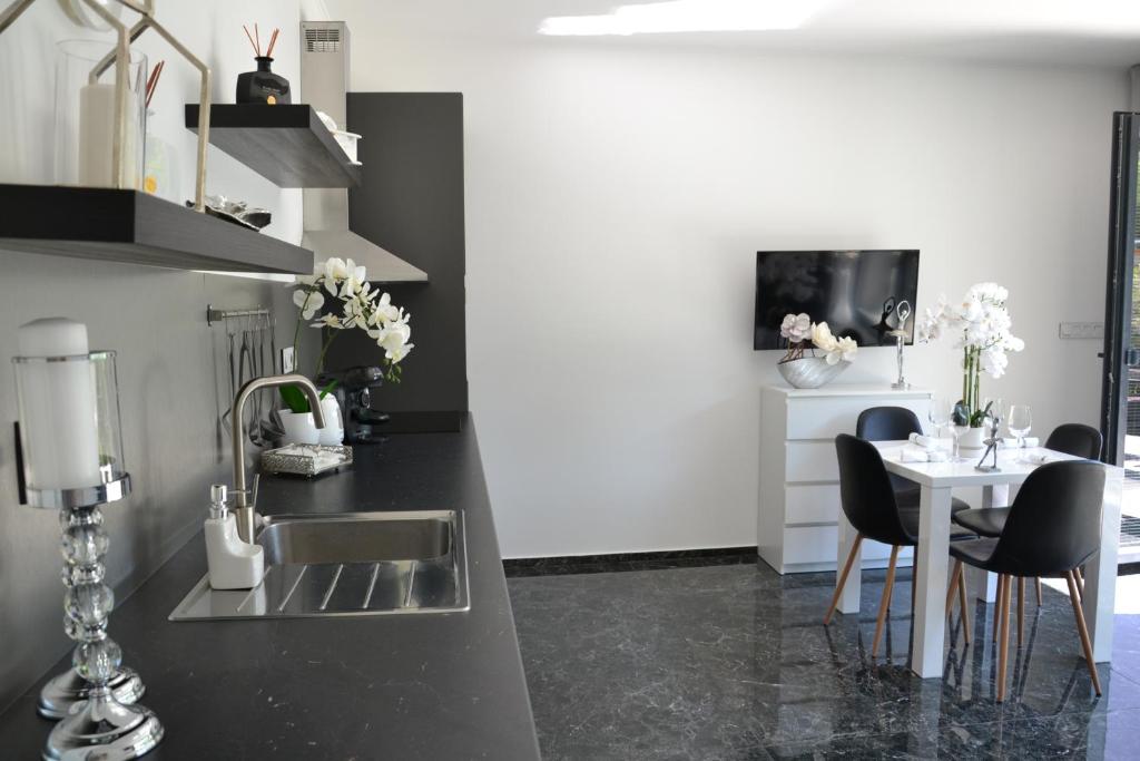 Kuchyň nebo kuchyňský kout v ubytování Apartmany u Polanských