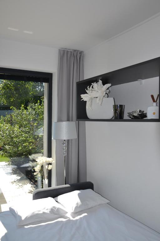 Postel nebo postele na pokoji v ubytování Apartmany u Polanských