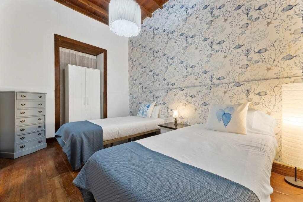 Posteľ alebo postele v izbe v ubytovaní Valls De Quintana Casa Emblemática Arrecife