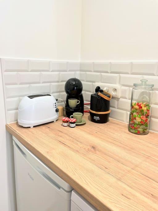 Kuchnia lub aneks kuchenny w obiekcie Hyper centre appartement Cosy WIFI
