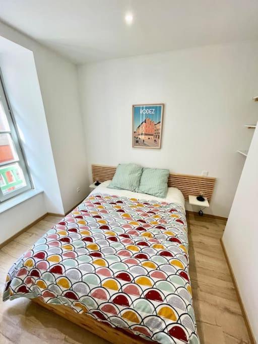Łóżko lub łóżka w pokoju w obiekcie Hyper centre appartement Cosy WIFI