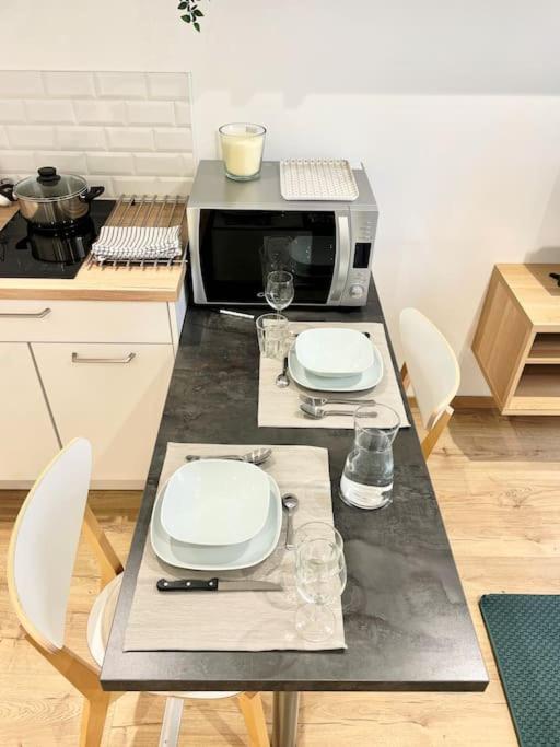 Kuchnia lub aneks kuchenny w obiekcie Hyper centre appartement Cosy WIFI