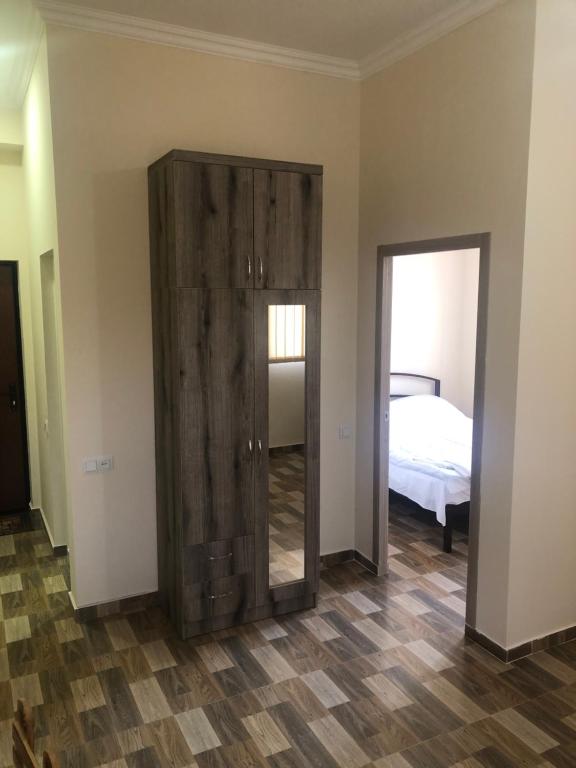 Postel nebo postele na pokoji v ubytování Nigatun Hotel