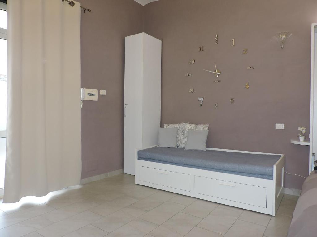 Letto o letti in una camera di Monolocale Via Cerquiglia, 136