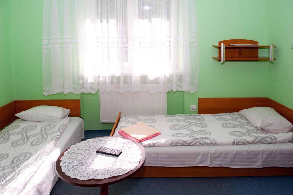 Postel nebo postele na pokoji v ubytování DW Potok