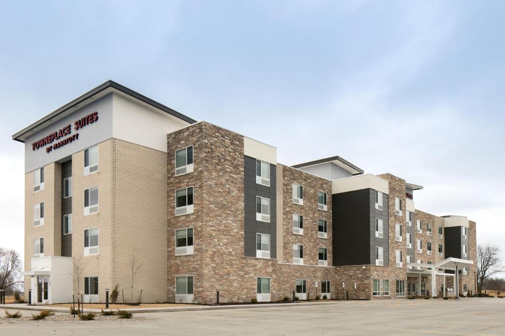 an image of the front of a building at TownePlace Suites by Marriott Oshkosh in Oshkosh