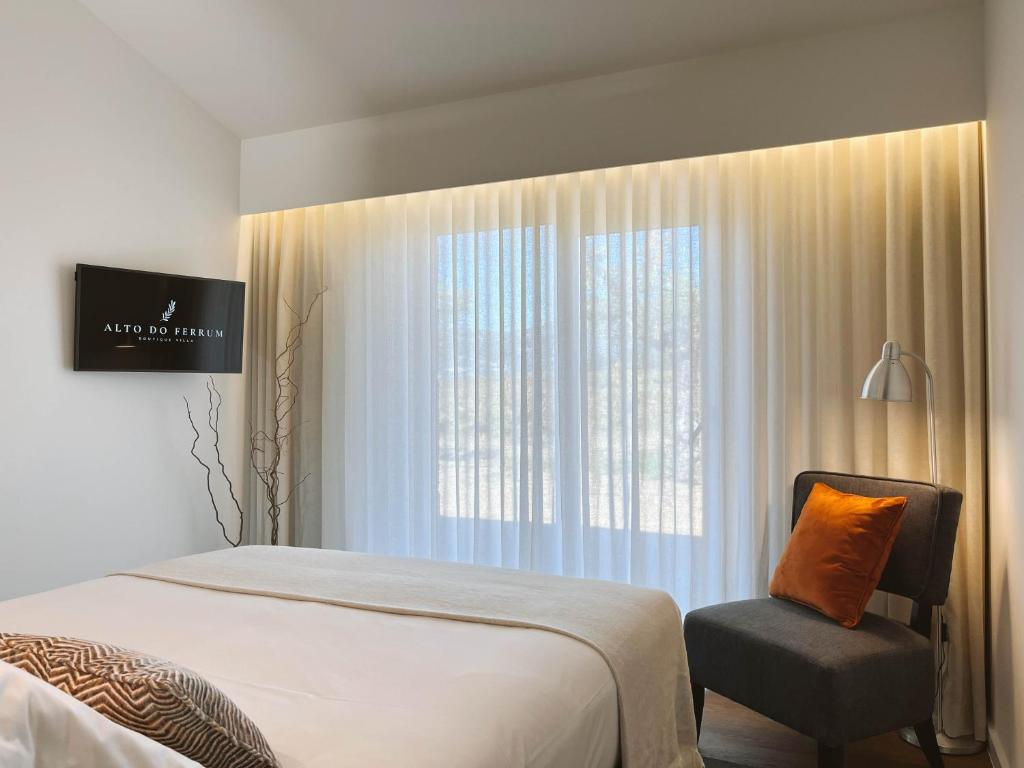 TV a/nebo společenská místnost v ubytování Alto do Ferrum - Boutique Villa