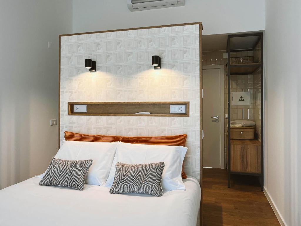 Postel nebo postele na pokoji v ubytování Alto do Ferrum - Boutique Villa