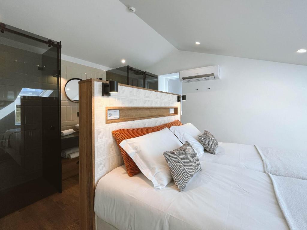 Postel nebo postele na pokoji v ubytování Alto do Ferrum - Boutique Villa