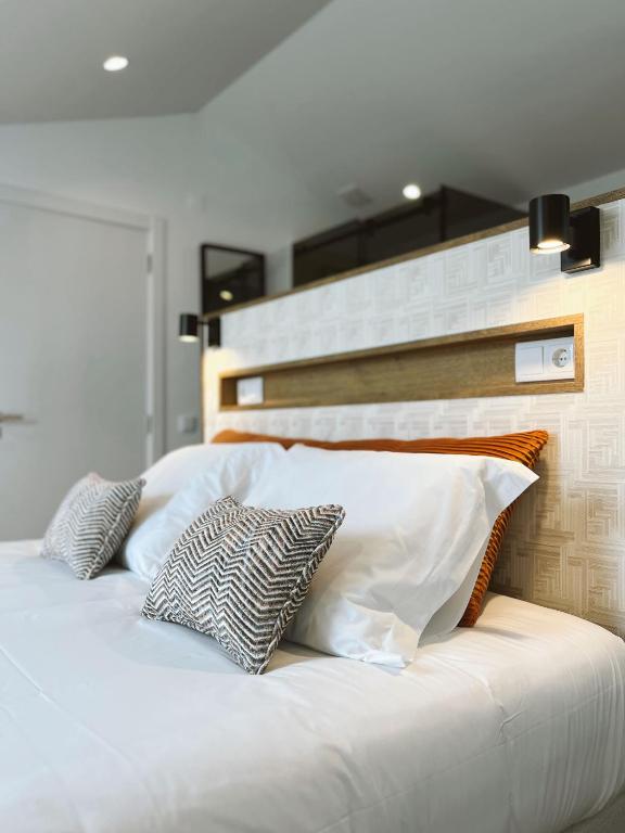 Postel nebo postele na pokoji v ubytování Alto do Ferrum - Boutique Villa