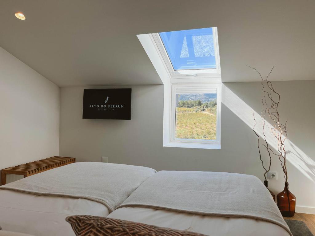 Postel nebo postele na pokoji v ubytování Alto do Ferrum - Boutique Villa