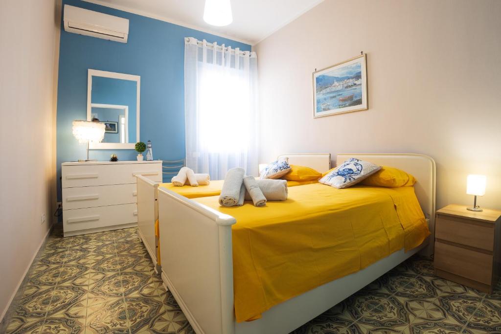 A bed or beds in a room at La Casa di Annale'