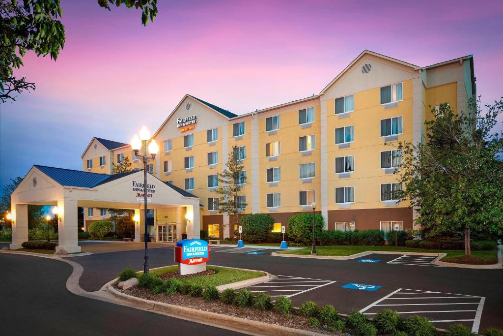 a rendering of a hotel with a parking lot at Fairfield Inn & Suites Chicago Midway Airport in Bedford Park