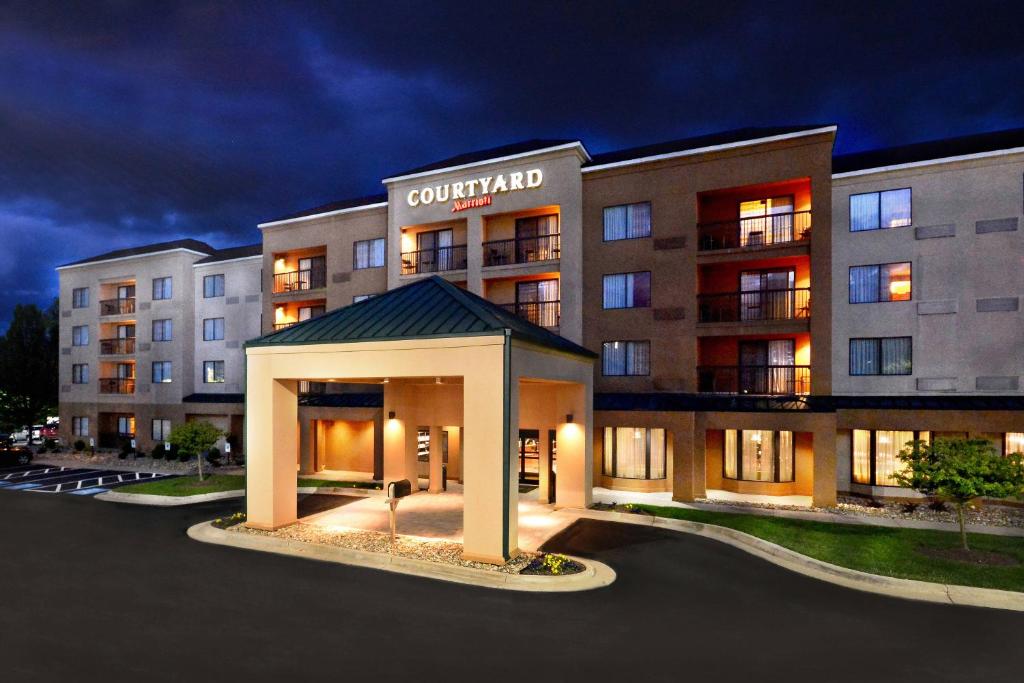 a hotel building with a gazebo in a parking lot at Courtyard Beckley in Beckley