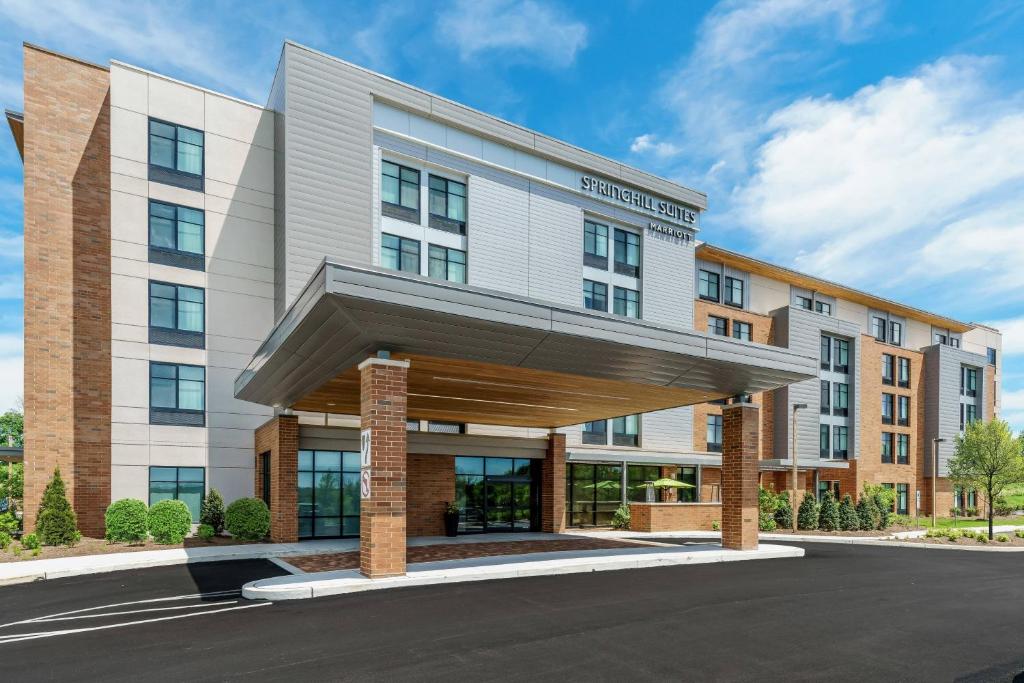 une représentation de l'avant d'un hôtel dans l'établissement SpringHill Suites by Marriott Philadelphia West Chester/Exton, à Exton