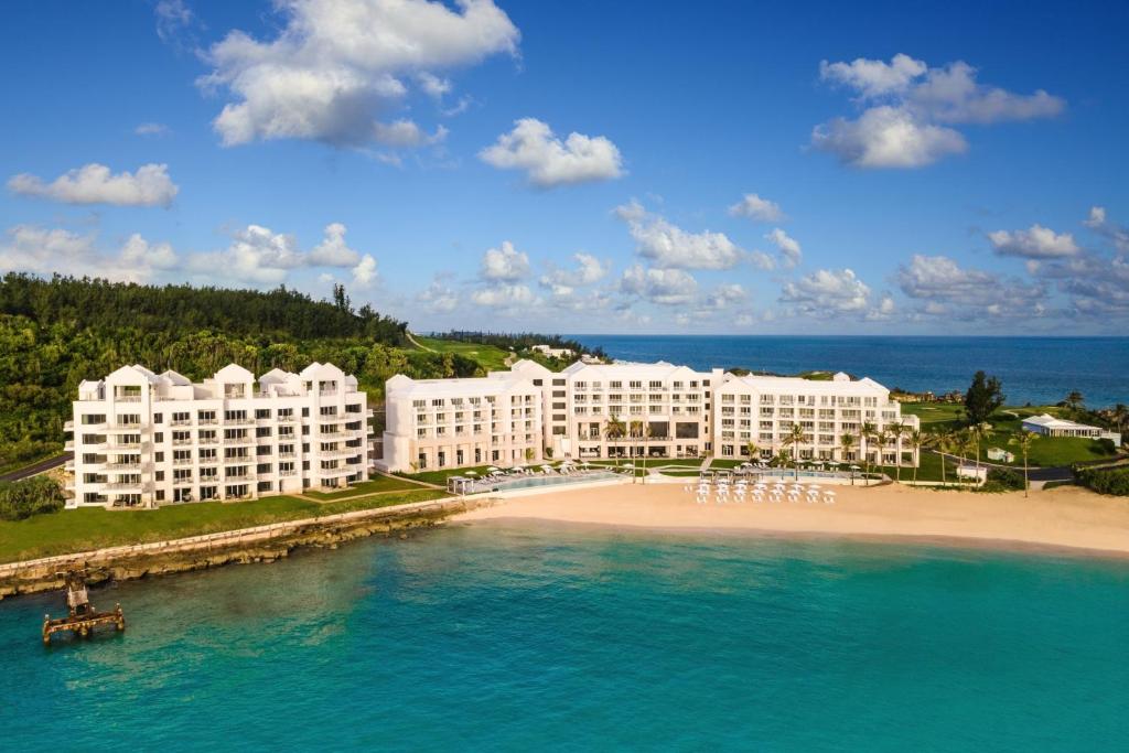 an aerial view of a resort on a beach at The Residences at The St. Regis Bermuda in Saint George