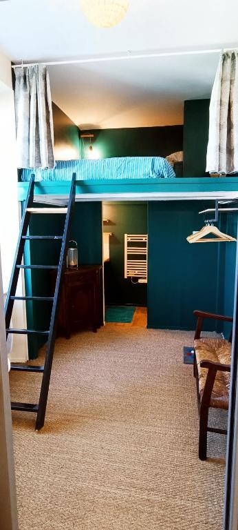 Llit o llits en una habitació de Vivez dans cet ancien semaphore avec vue mer