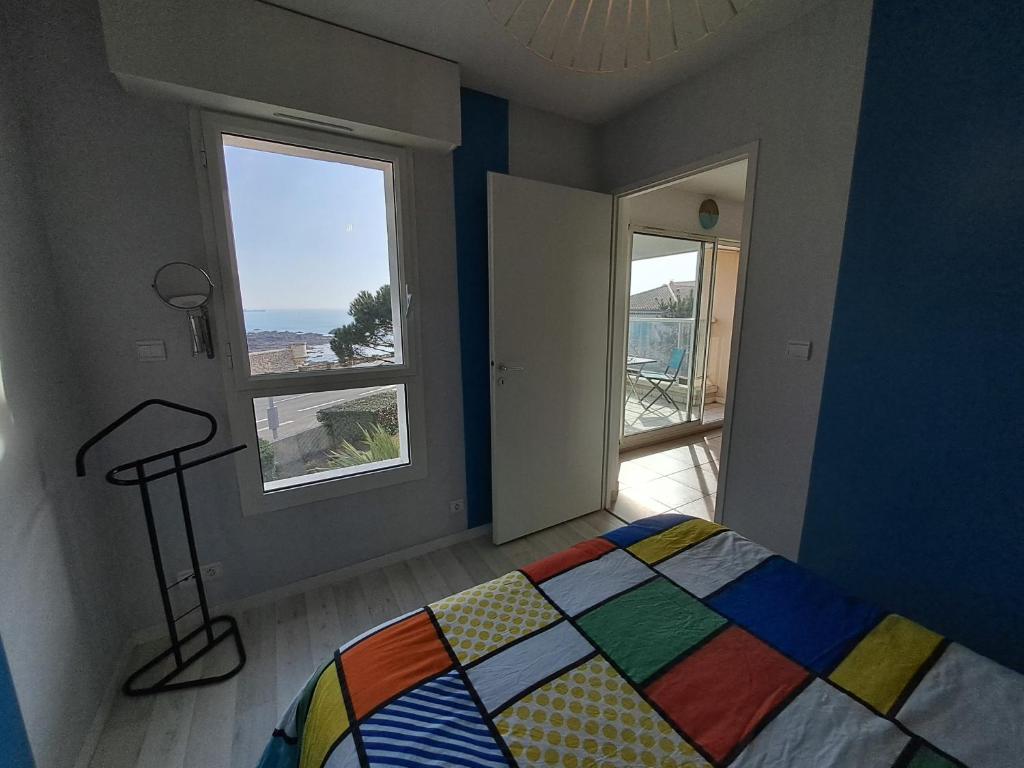 Posteľ alebo postele v izbe v ubytovaní Ancora2- Appartement vue mer et place de parking