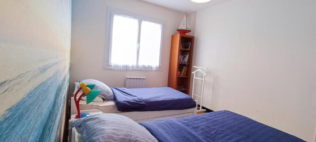 Posteľ alebo postele v izbe v ubytovaní Baleiniers - Maison 6 pers - prox mer - Les sables