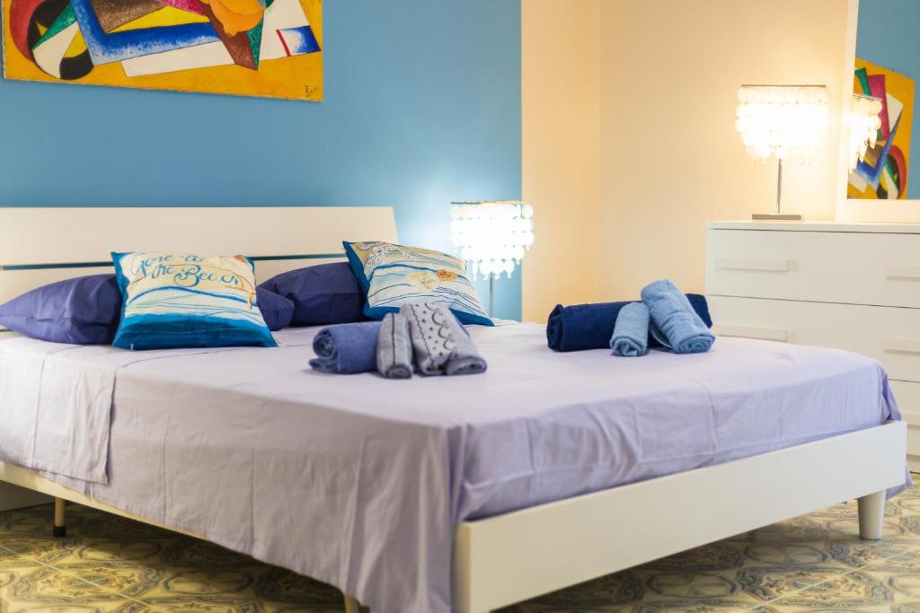 A bed or beds in a room at La Casa di Annale'