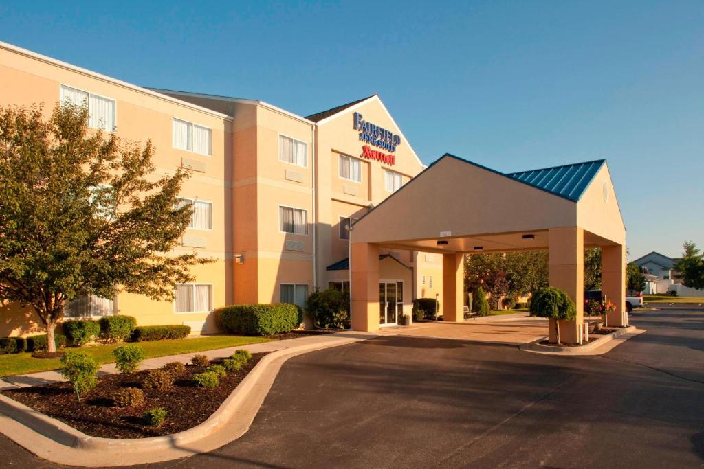 a rendering of a hotel with a parking lot at Fairfield Inn & Suites Mt. Pleasant in Mount Pleasant