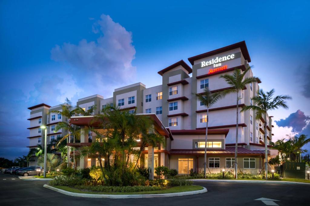 a rendering of the exterior of a hotel at Residence Inn by Marriott Miami West/FL Turnpike in Miami