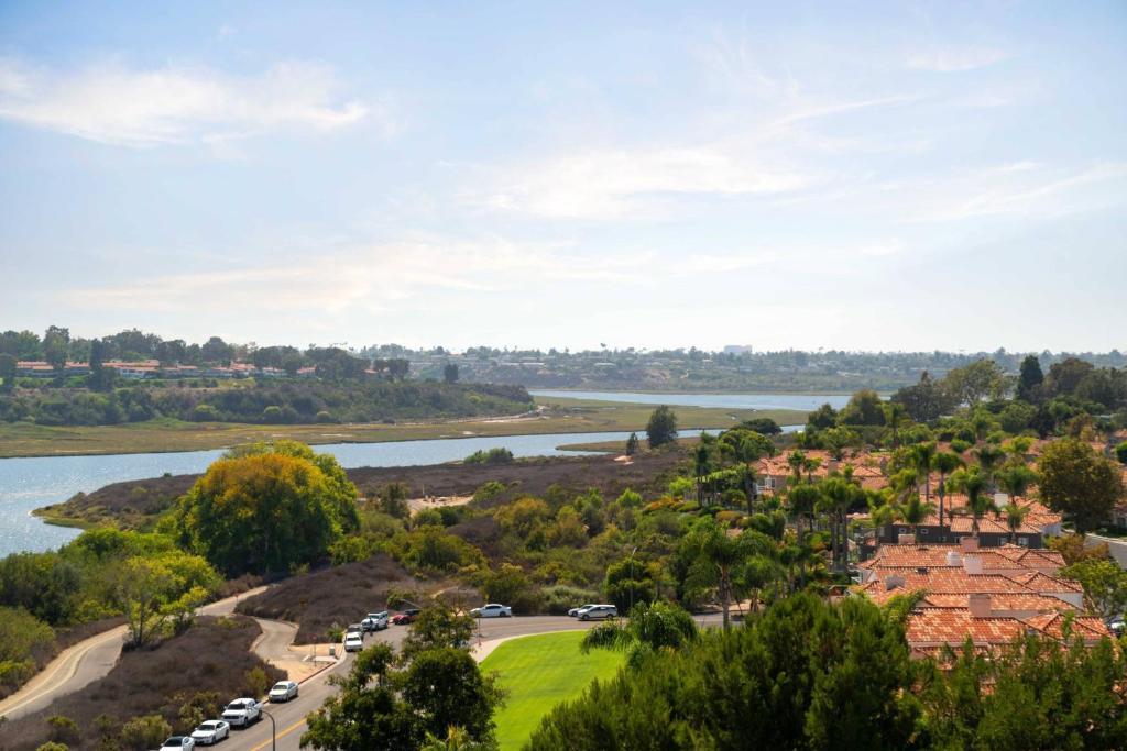an aerial view of a road and a river at Newport Beach Marriott Bayview in Newport Beach