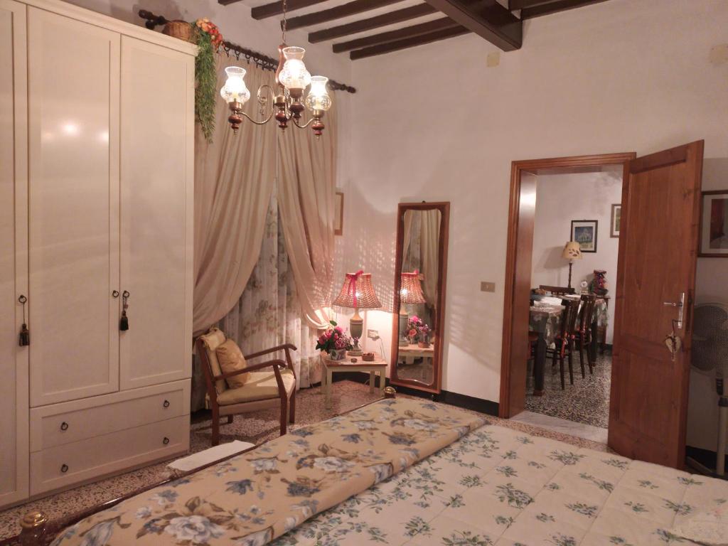 Postel nebo postele na pokoji v ubytování Casa Tarrini