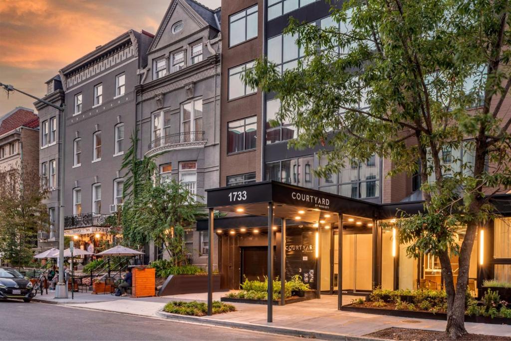 a rendering of the entrance to the grafton building at Courtyard by Marriott Washington, DC Dupont Circle in Washington