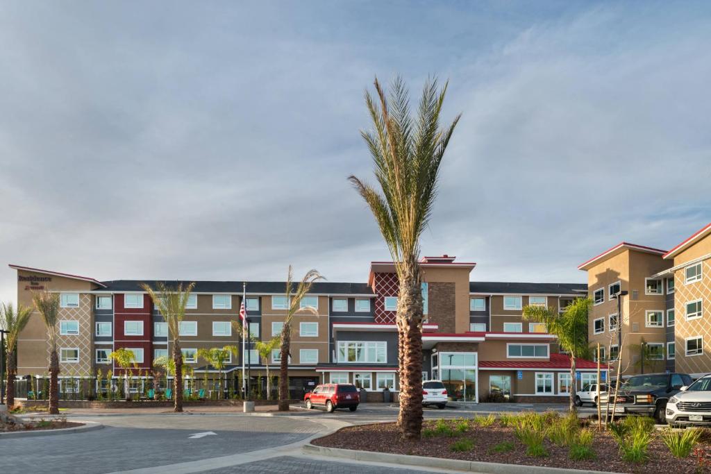 a palm tree in front of a building at Residence Inn by Marriott Temecula Murrieta in Murrieta