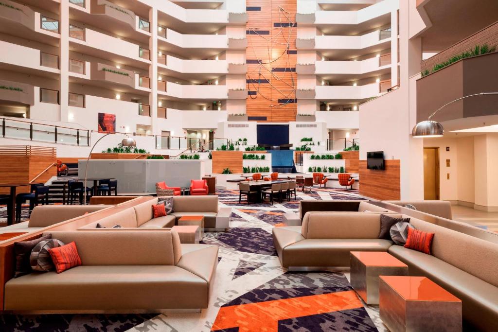 a lobby with couches and tables in a building at Residence Inn by Marriott Seattle Downtown/Lake Union in Seattle