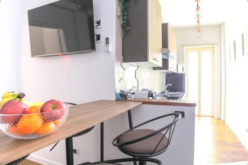 Elegantis Vatican Suite Apartmentにあるキッチンまたは簡易キッチン