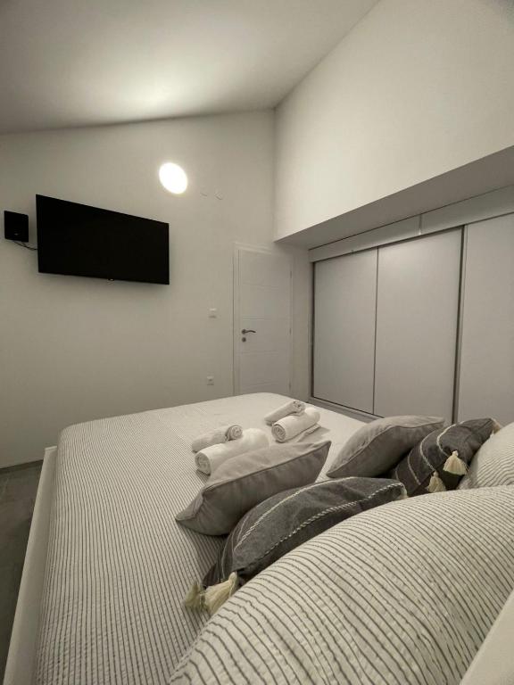 Postel nebo postele na pokoji v ubytování Apartment Olyntha