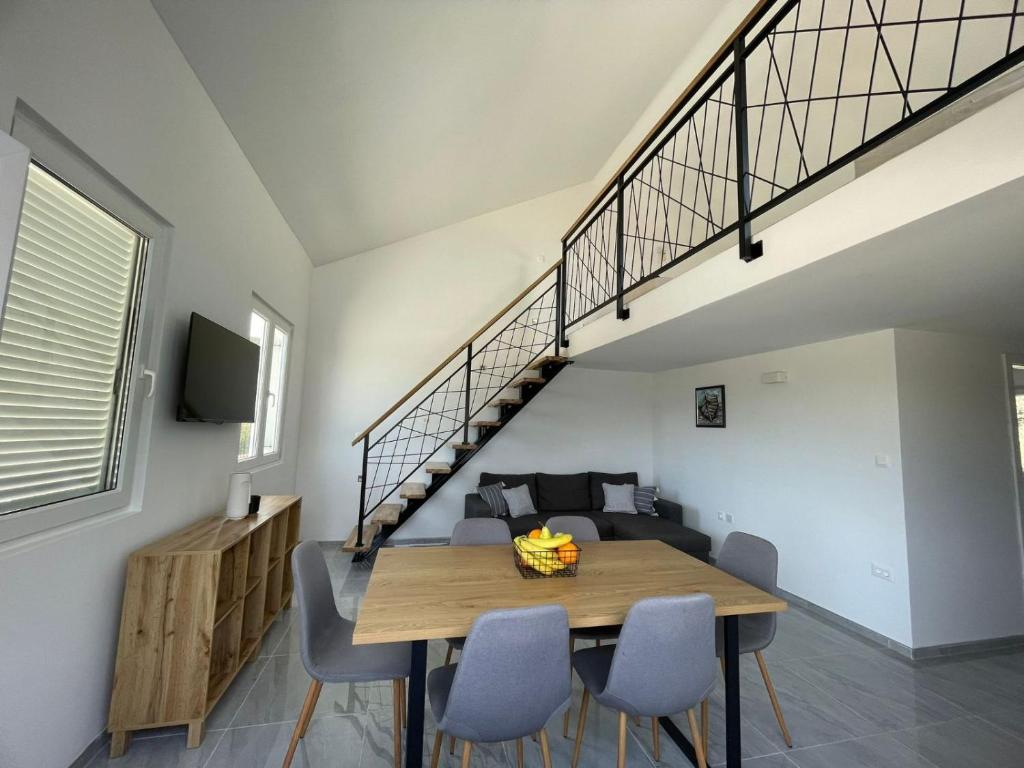 TV a/nebo společenská místnost v ubytování Apartment Olyntha