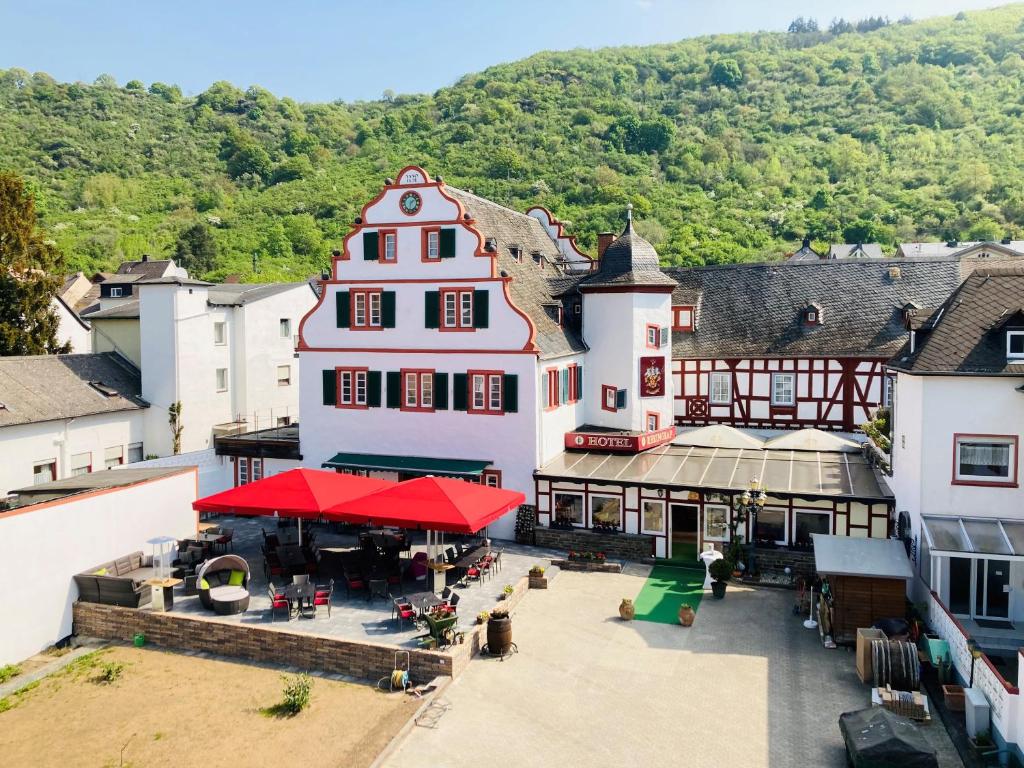 an aerial view of a building in a town at Hotel Rheingraf in Kamp-Bornhofen