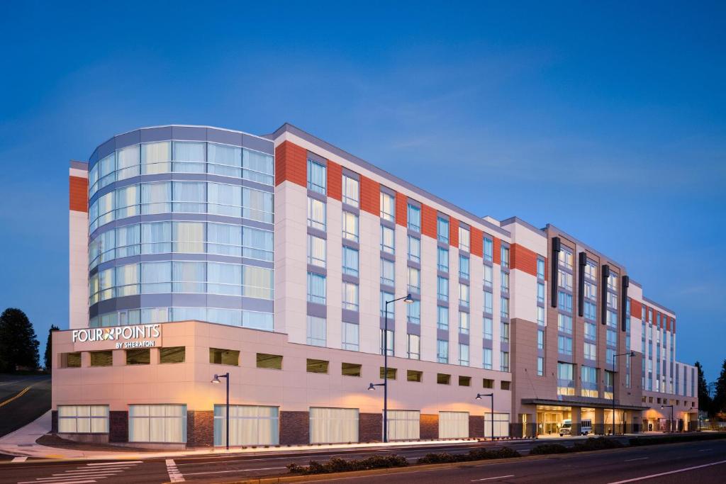 a rendering of the front of a building at Four Points by Sheraton Seattle Airport South in SeaTac