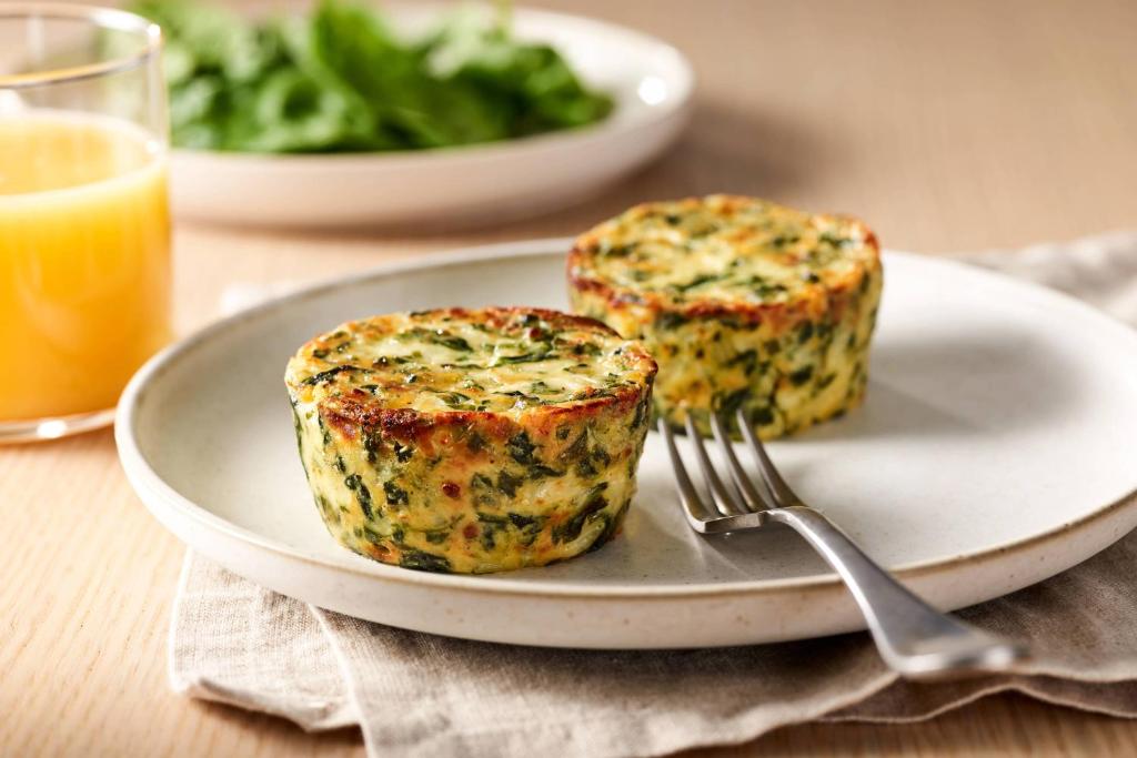 une assiette avec deux muffins sur une table à fourchette dans l'établissement Fairfield Inn & Suites by Marriott Huntsville, à Huntsville