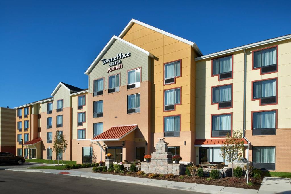 a rendering of a hotel with a building at TownePlace Suites by Marriott Detroit Troy in Troy
