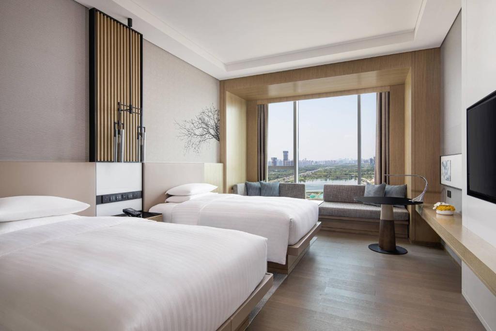 Courtyard by Marriott Chengdu Southにあるベッド