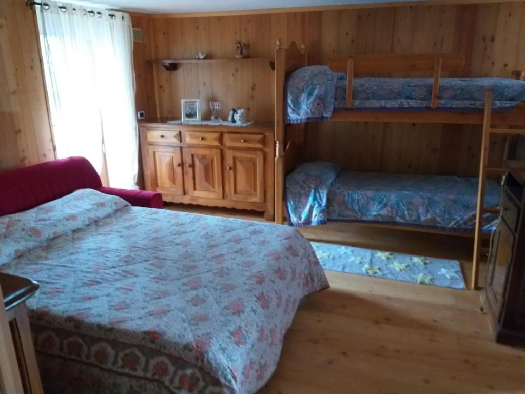 Postel nebo postele na pokoji v ubytování Casa Mimosa