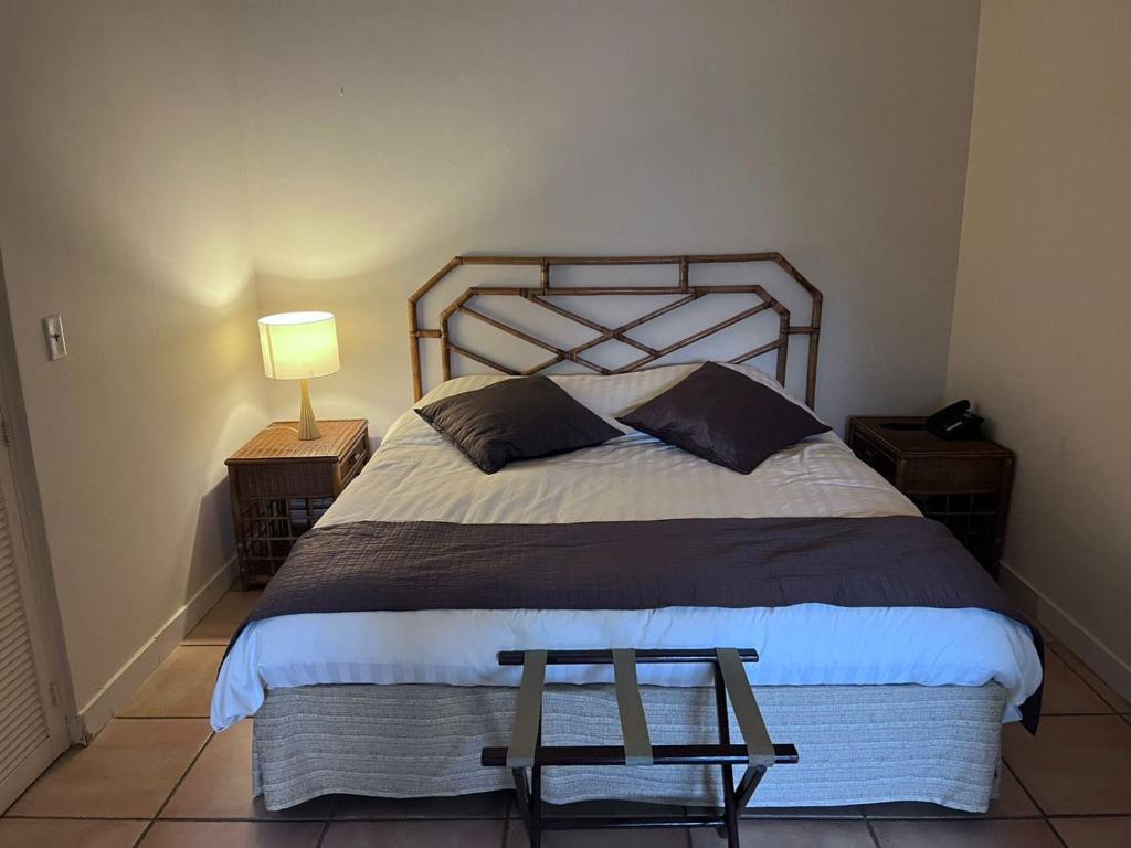 Postel nebo postele na pokoji v ubytování Cacao Suite in Coronado Luxury Club Golf & Beach